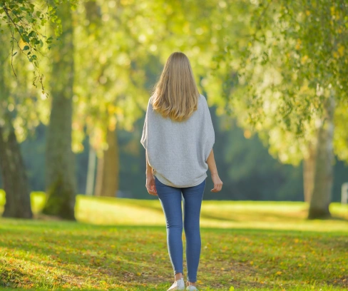newsletter subscribe image of woman walking away